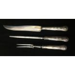 RUSSELL BRADLEY & CO., AN EARLY 20TH CENTURY SILVER PLATED THREE PIECE CARVING SET Comprising a