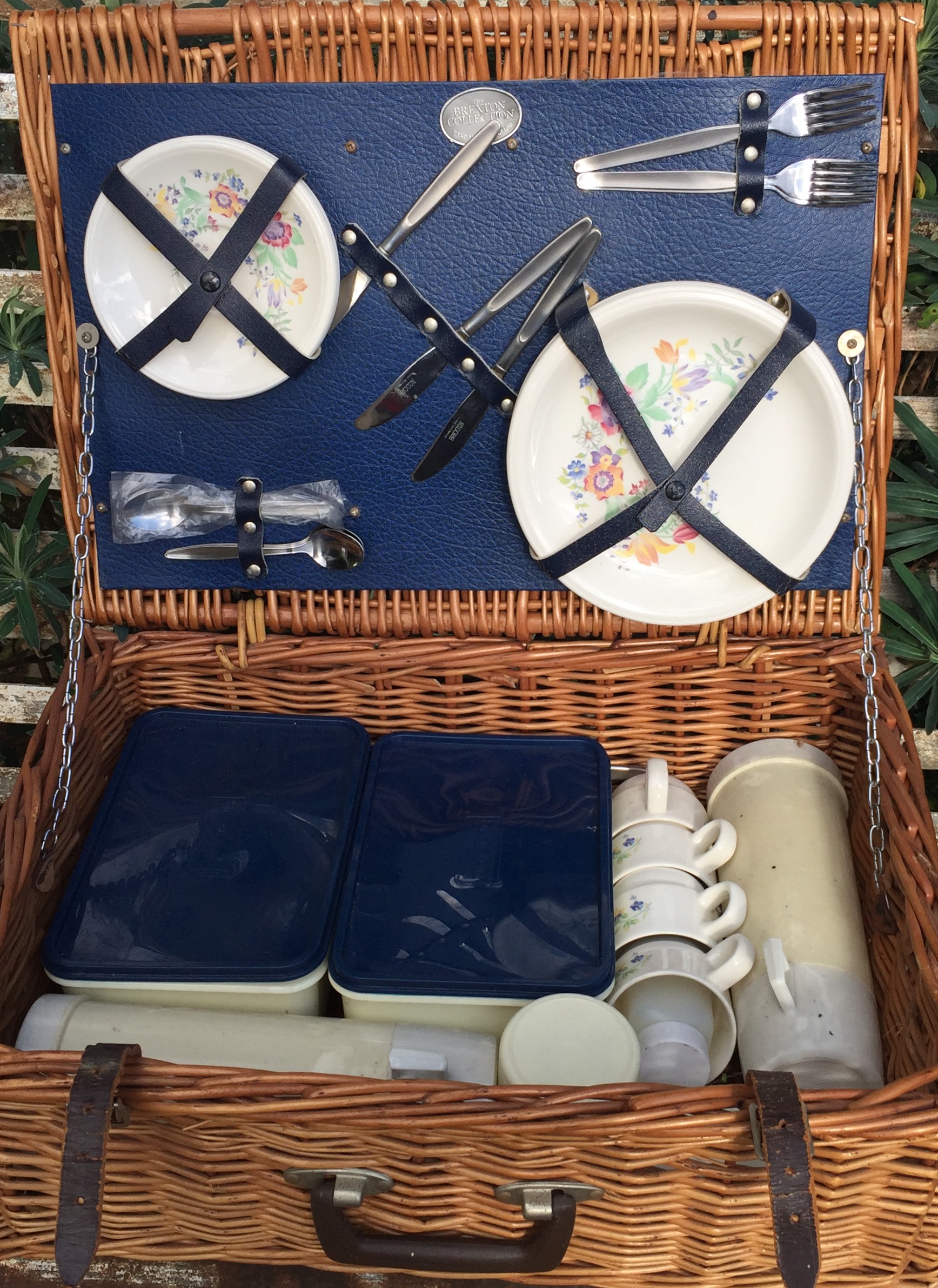 THE BREXTON COLLECTION, A WICKER PICNIC HAMPER Complete with contents. (53cm x 38cm x 20cm)