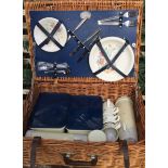 THE BREXTON COLLECTION, A WICKER PICNIC HAMPER Complete with contents. (53cm x 38cm x 20cm)