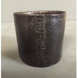 A 17TH/18TH CENTURY BROWN LEATHER BEAKER With stitched side seam (probably used as a dice cup). (h