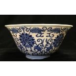 A FINE CHINESE BLUE AND WHITE PORCELAIN CIRCULAR BOWL Of flared form, having a short foot rim,