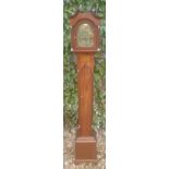 AN EARLY 20TH CENTURY MAHOGANY GRANDMOTHER CLOCK The swan necked pediment above an arched engraved