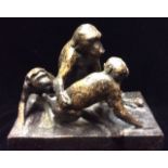 AN EARLY 19TH CENTURY CAST IRON FIGURAL GROUP OF BABOONS A mother and playful cubs, finely cast with