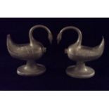 AUGUST WEYGANG, A PAIR OF 19TH CENTURY GERMAN PEWTER MASTER SALT CELLARS Cast as swans on a pedestal