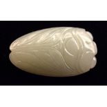 A CHINESE WHITE JADE CICADA CARVING With finely carved folded wings and bug eyes. (approx 4.5cm)