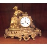 A 19TH CENTURY FRENCH ROCOCO ORMOLU CLOCK With striking drum movement. (h 27.5cm)