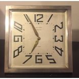 DENY GRAU, 'TOURGOING', A FRENCH ART DECO CHROME MANTLE CLOCK With silvered dial and platform