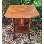 AN EDWARDIAN ROSEWOOD AND CROSSBANDED OCCASIONAL TABLE The top applied with a satin inlaid floral