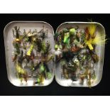 A COLLECTION OF FIFTY PLUS FISHING FLIES Contained in a white metal case.