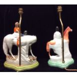 STAFFORDSHIRE, TWO LATE 19TH CENTURY POTTERY EQUESTRIAN FIGURES Mounted as lamps, 'First Ride', a