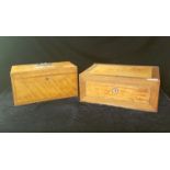 TWO EARLY 19TH CENTURY SATINWOOD AND ROSEWOOD RECTANGULAR BOXES With oval brass carry handle,