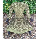 AN EARLY VICTORIAN CARVED WALNUT OPEN ARMCHAIR With lime damask upholstery and scrolling arms