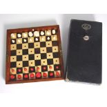 Late 19th Century Jaques in Statu Quo Travel Chess Set with Bone pieces in a Folding Mahogany,