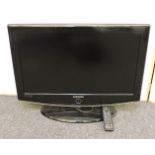 A Samsung 26in LCD television, model number LE26R878D, with remote control