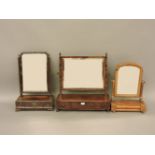 A George III mahogany dressing table mirror, with box base, a further box based mirror, and a