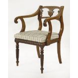 A Regency mahogany bar back elbow chair, with spiral reeded front legs