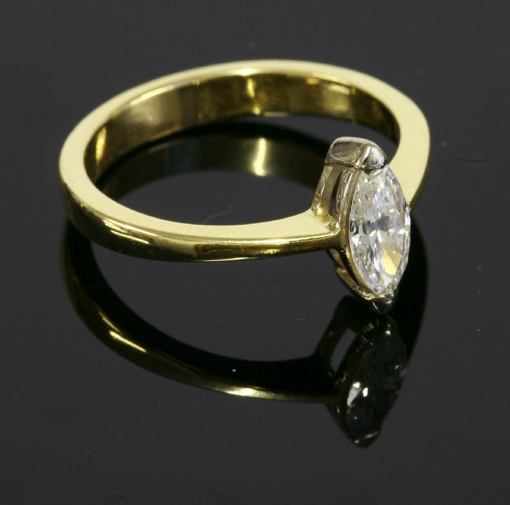 An 18ct gold single stone diamond ring, with a marquise cut diamond estimated as approximately 0.