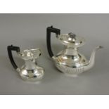 A silver coffee pot, and a silver hot water jug, both by H E Sheffield, 1907