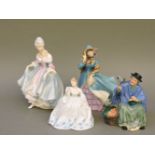 Three Royal Doulton figures, 'Southern Belle' HN2425, 'Delphine' HN2136 and 'Tuppence a Bag' HN2320,