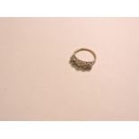 A graduated five stone diamond ring, marked 18ct plat