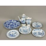 An 18th century Delft charger, decorated with a blue and white chinoiserie pattern, 34cm, four