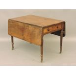 A mahogany Pembroke table, with reeded edge to top and leaves