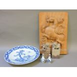 A pair of Chinese soapstone dogs of Fo, a pair of Chinese miniature blue and white vases, 8.5cm, a