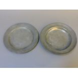 A pair of 18th century pewter plates