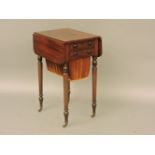 A Victorian mahogany drop leaf work table, with two drawers over velvet covered wool box, on ring