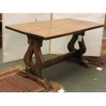 An oak refectory table, with shaped end supports, top 148 x 72cm