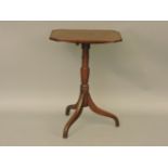 An early 19th century mahogany snap top wine table