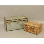 An old travelling trunk, and a pine Quaker Oats store box