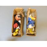 Two Pelham Puppets, Mickey Mouse and Donald Duck, in brown boxes