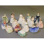 Fifteen small Royal Doulton figures of ladies