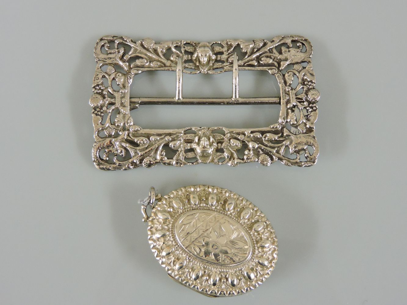 A late Victorian sterling silver buckle, Birmingham 1900, together with a late Victorian sterling