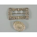 A late Victorian sterling silver buckle, Birmingham 1900, together with a late Victorian sterling