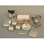 Silver items, to include a Georgian cream jug, two cigarette cases, cruet items, a small Chinese