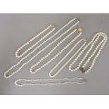 A single row graduated cultured pearl necklace, with a paste set clasp, together with five cased