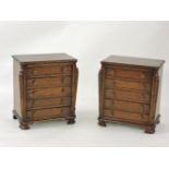 A pair of reproduction mahogany five drawer chests, 53cm wide, 62cm high