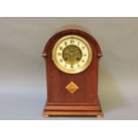 An Edwardian style mantel clock, with French drum movement, visible escapement, later mahogany case,