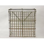 A French iron wine rack, with two doors, 102cm wide, 111cm high