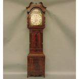 A Victorian mahogany cased eight day longcase clock, with a swan neck pediment over a painted dial