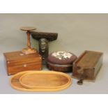 A Victorian mahogany and mother of pearl inlaid work box, an antique turned candle stand, a candle