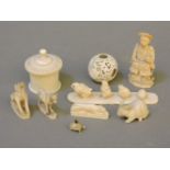 A collection of Chinese and Indian carved ivory pieces, comprising 'The Evolution of the Bird from