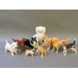 Nine Beswick and Royal Doulton figures of dogs