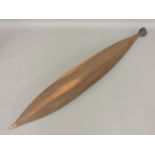 An Aboriginal carved wood spear thrower, 93cm long