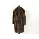 A musquash three quarter length fur coat