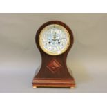 An Edwardian style mantel clock, ceramic dial, French drum movement, mahogany case, 32cm