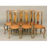 A set of six early 20th century Queen Anne style high back dining chairs, with cabriole legs, united