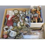 A quantity of early 20th century novelty wine stoppers, cork screws, etc
